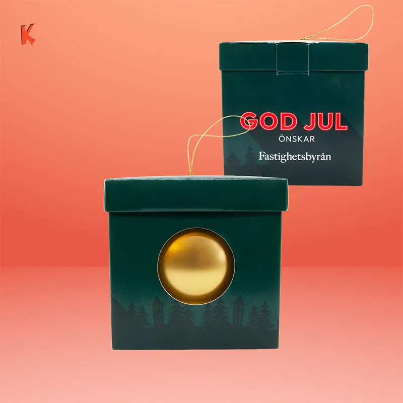 Julkula guld med inslaget varumärkesgodis